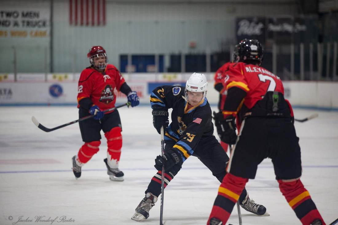 Warriors skater battles two Comrades players