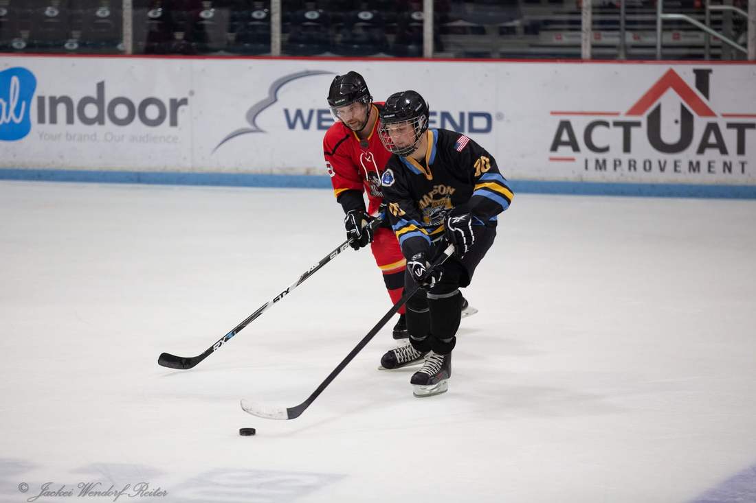 Warriors forward drives with the puck