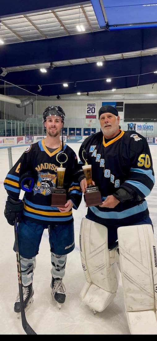 Alex Koritzinsky #6 and Keven Kramer #50 with tournament awards